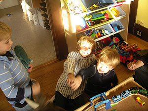 Hanging with the big boys is fun, particularly when they're as kind and interactive as these two! (Note trains in the foreground. Calvin's buddy has a train table that still has him mumbling about it as he drifts off to sleep!)