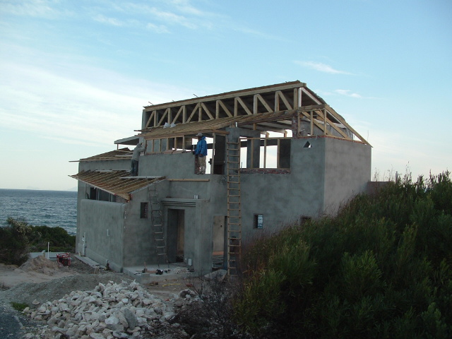 Details of the roof trusses and the interesting rooflines can be seen developing at all levels