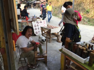 The stone cutting master makes C's chop.